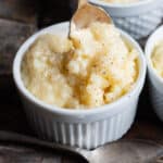 a spoon in a cup of instant tapioca pudding