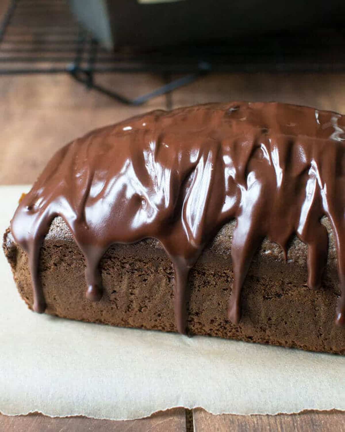 a loaf of chocolate coffee pound cake on a table