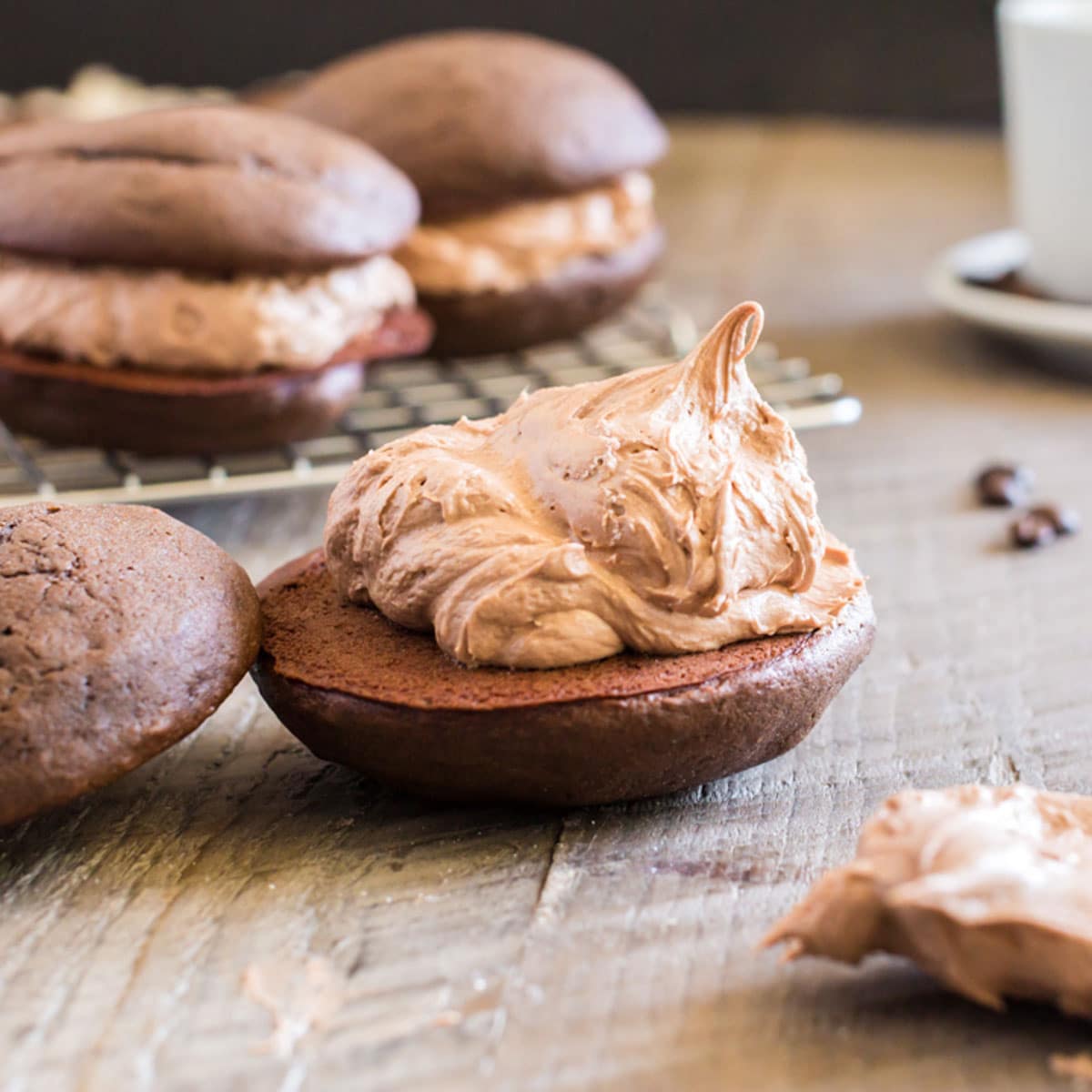 half of a whoopie pie with mocha buttercream on top