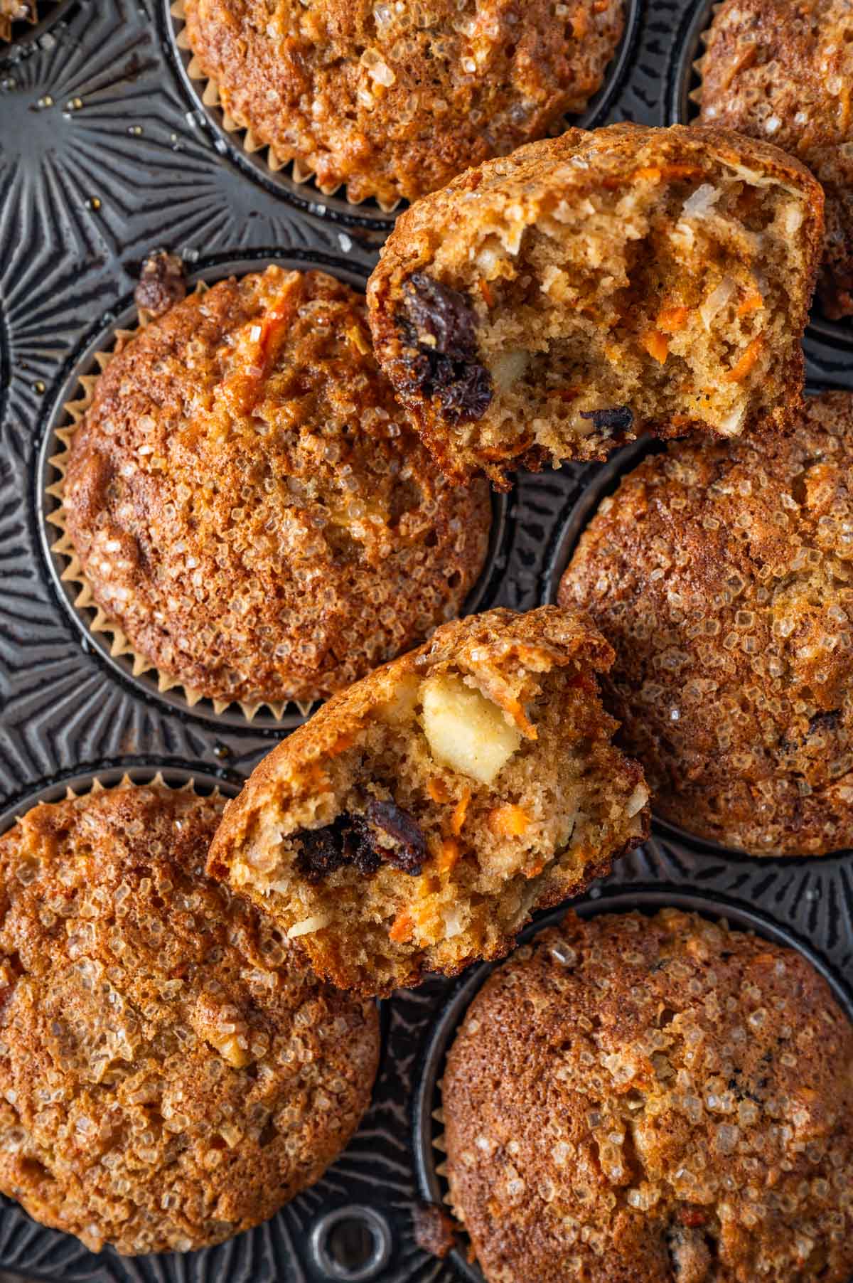 morning glory muffin broken in half in a pan