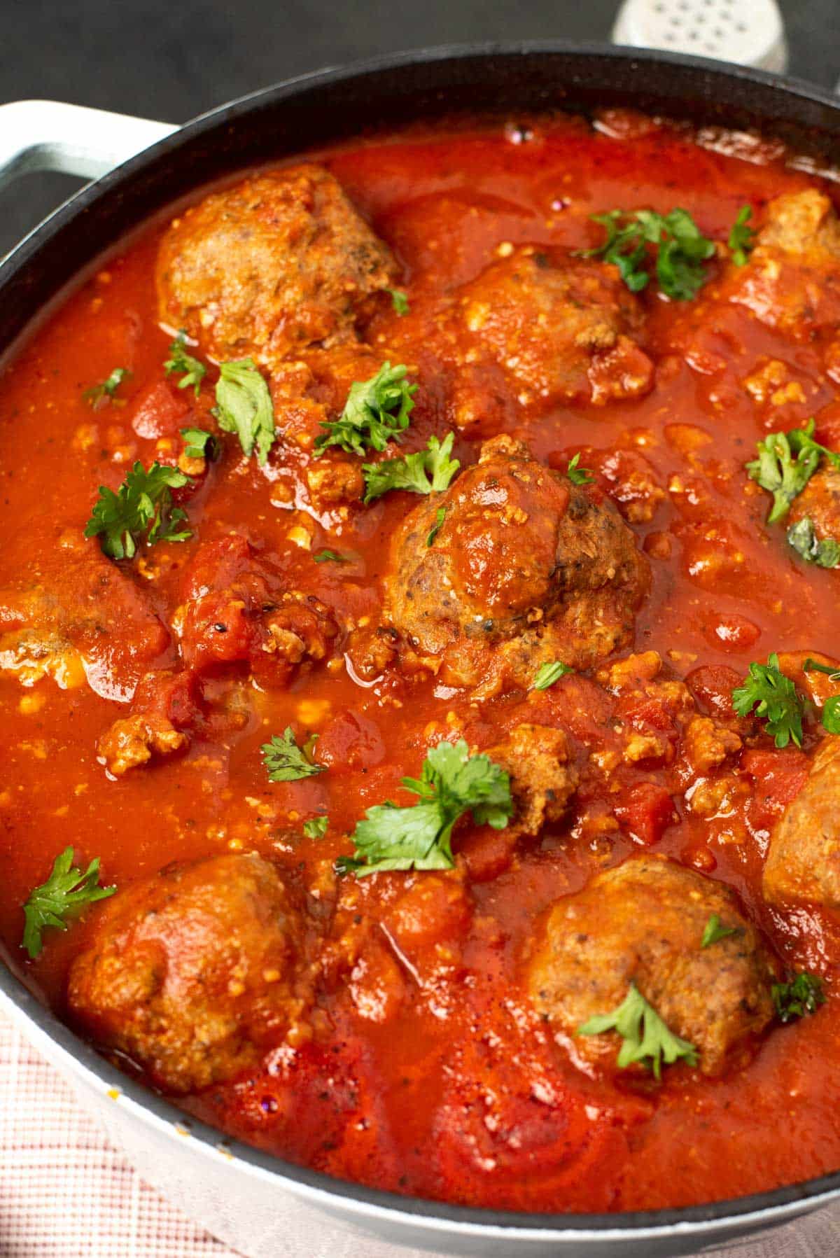 a pot of paleo meatballs in sauce