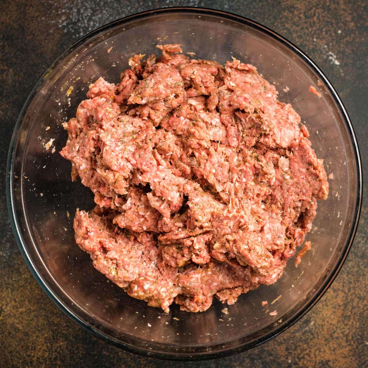 meatball mixture in a glass bowl