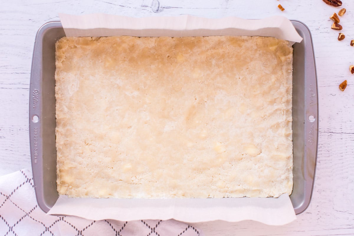 shortbread crust in a baking pan