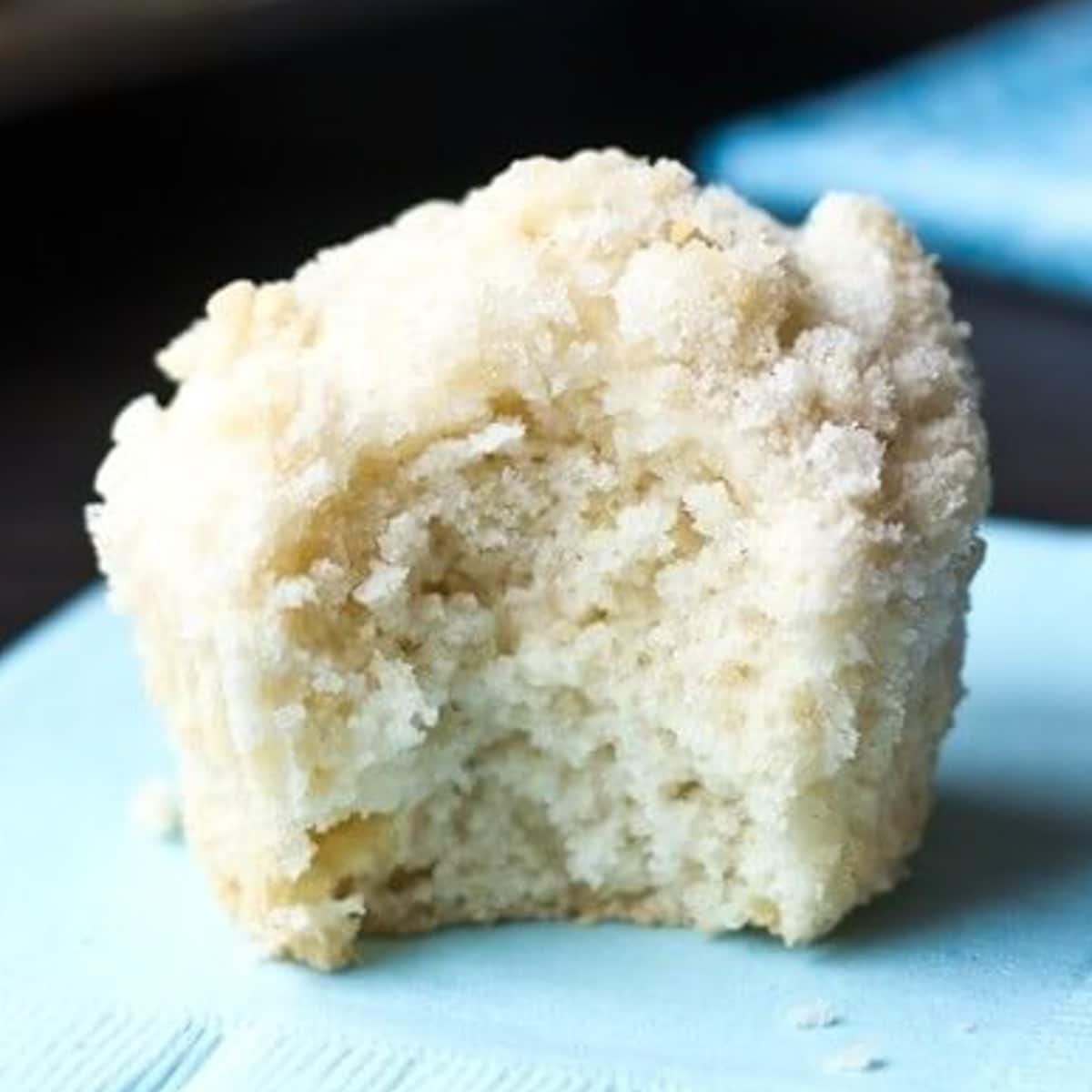 a bite out of a vanilla shortcake muffin