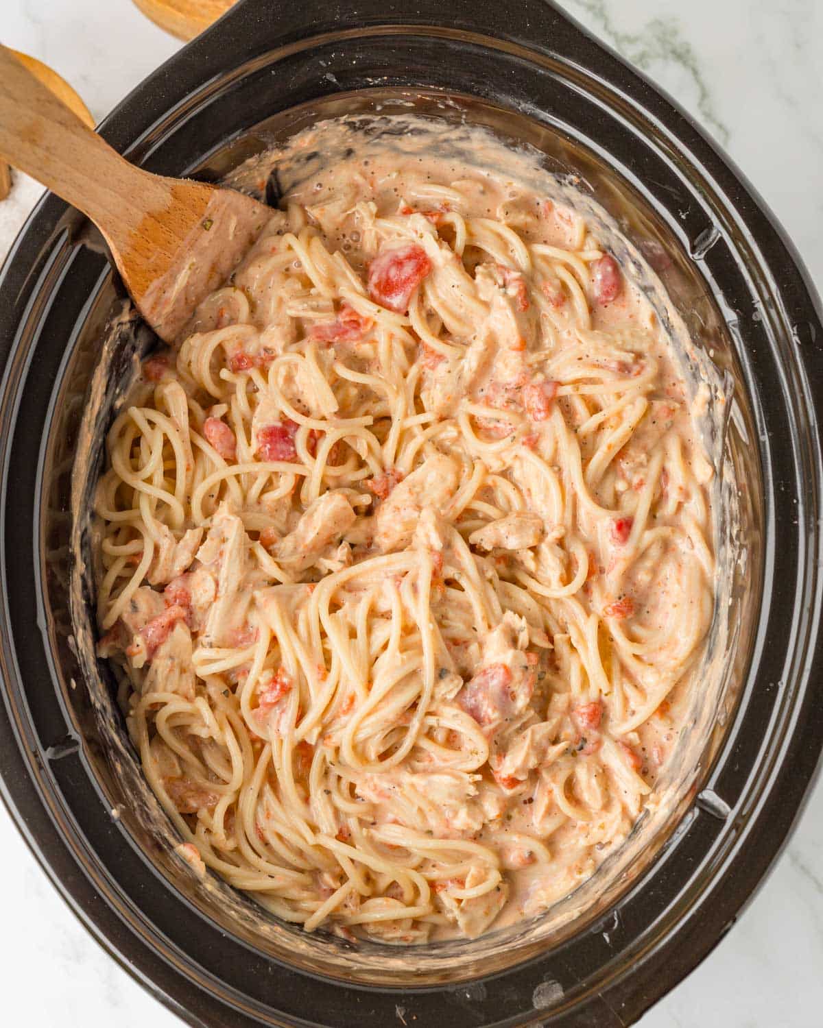 creamy chicken spaghetti in a slow cooker