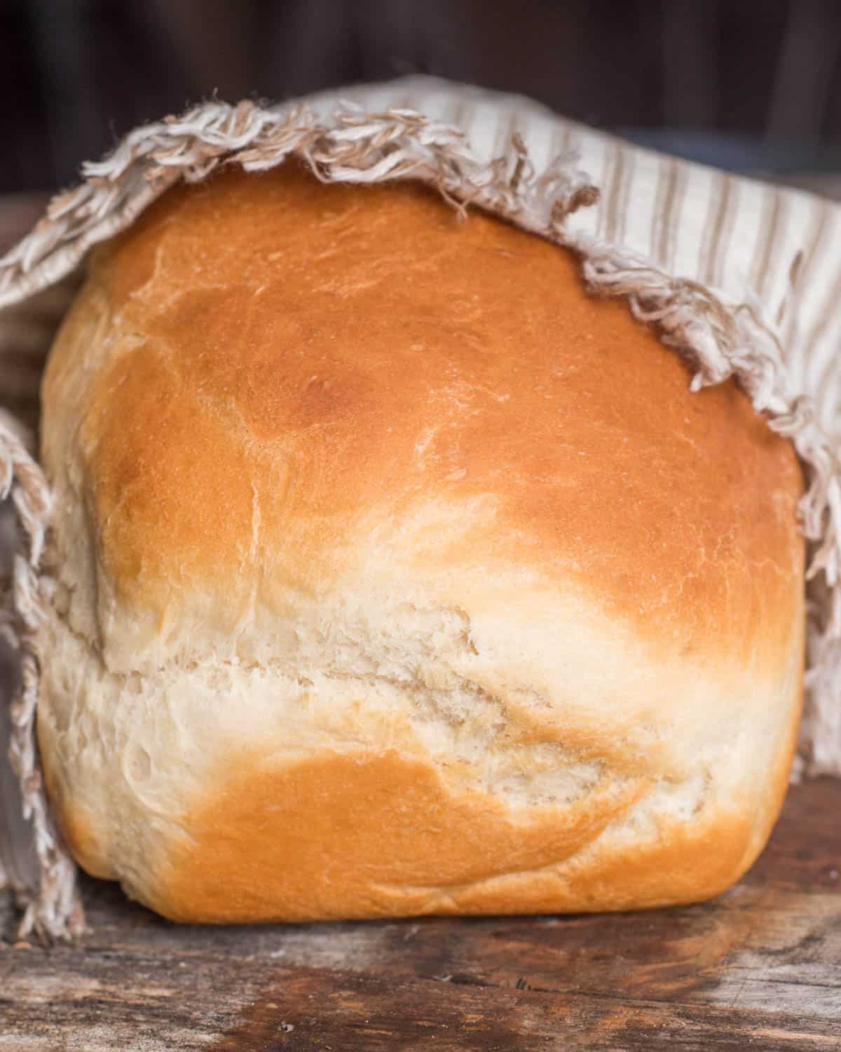 sourdough discard sandwich bread on a table with a napkin