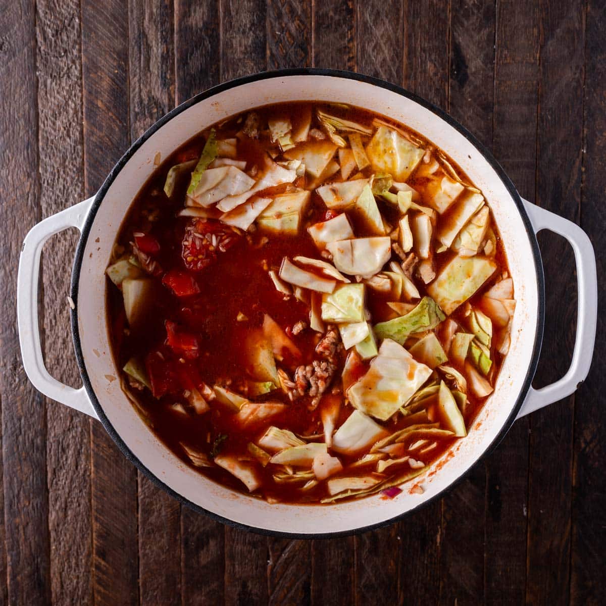 uncooked cabbage roll soup in a dutch oven