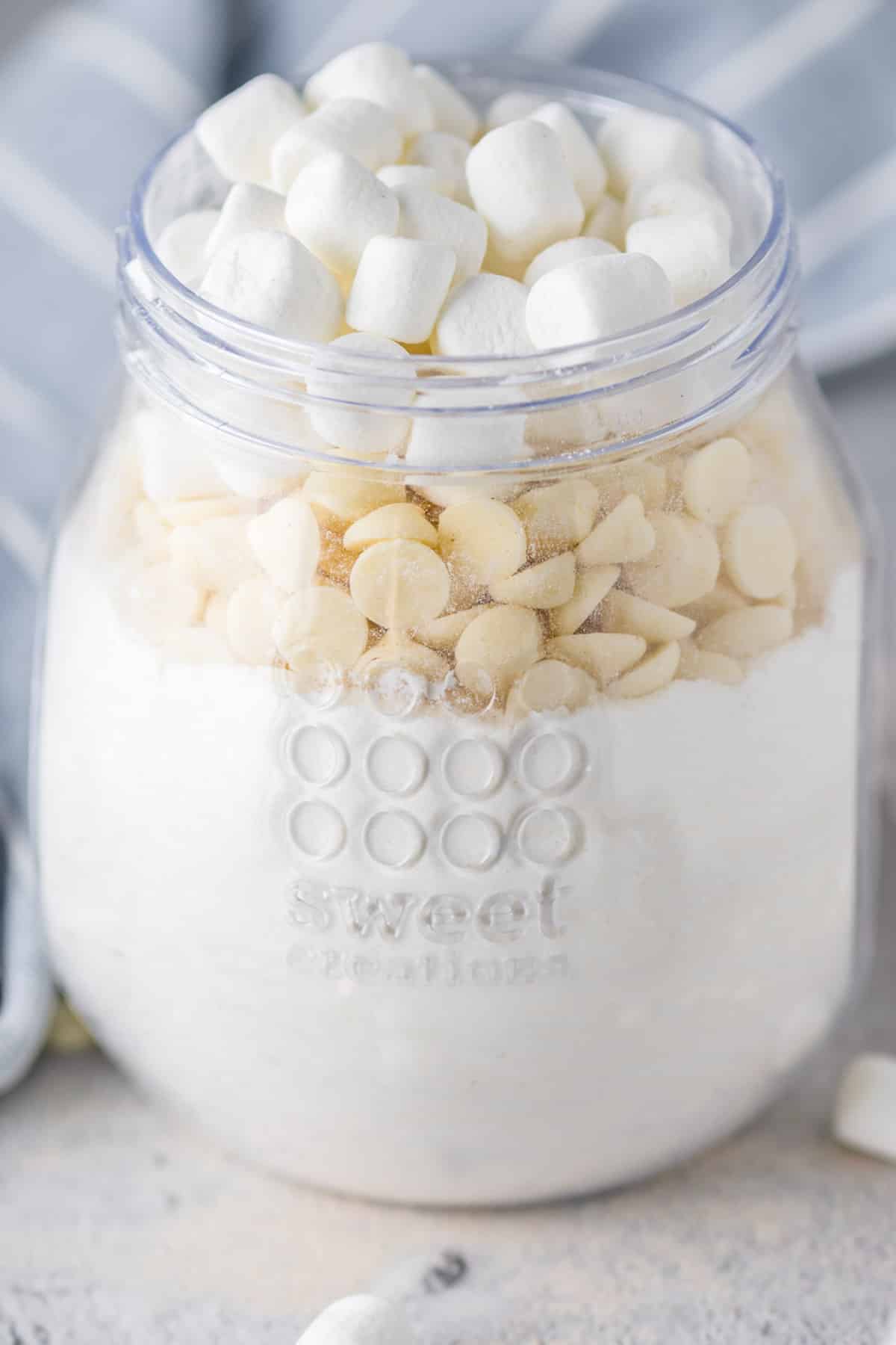 white hot chocolate powder mix in a glass jar