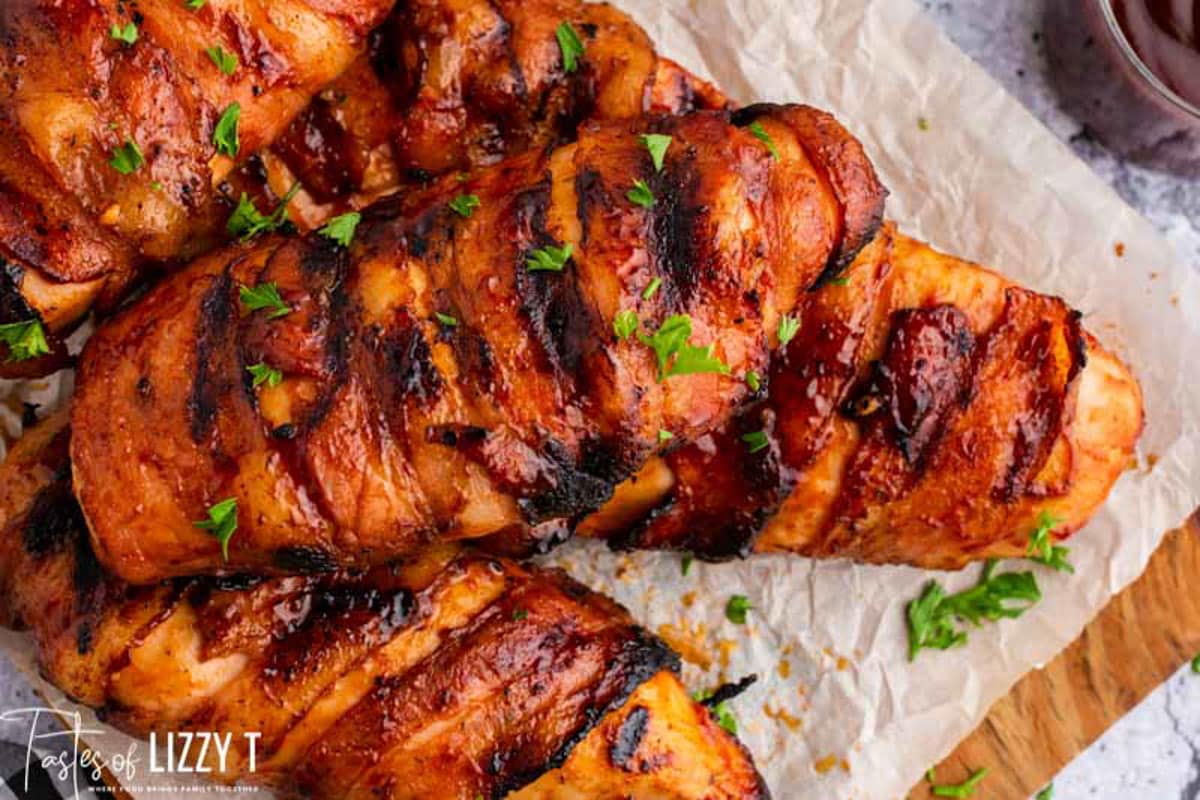 bacon wrapped chicken on a table