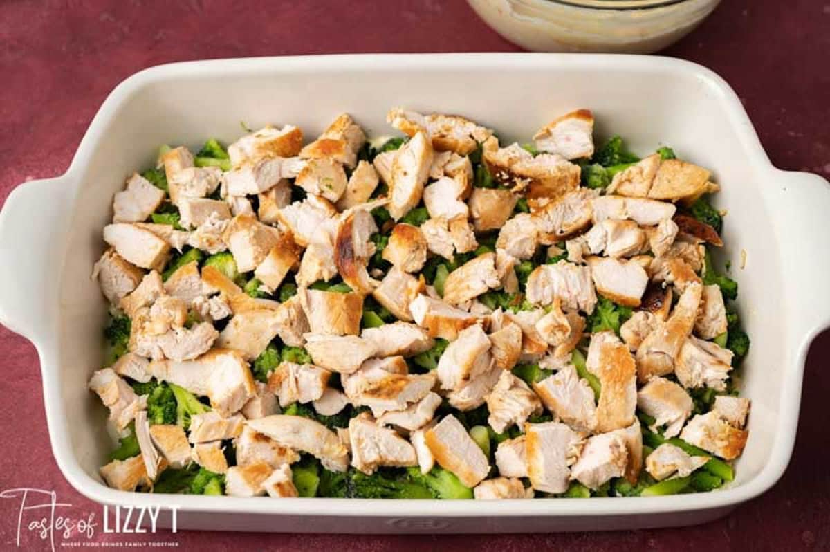 chicken over broccoli in a baking pan