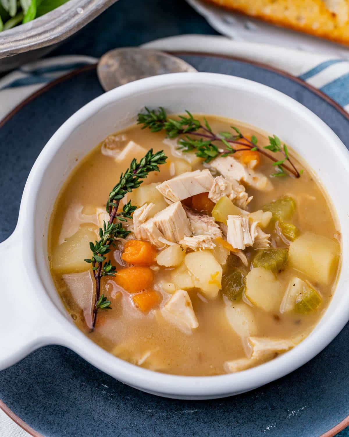 a bowl of chicken potato soup