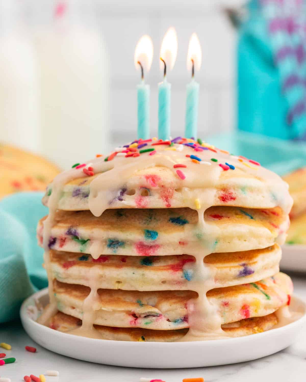 a stack of funfetti pancakes for a birthday