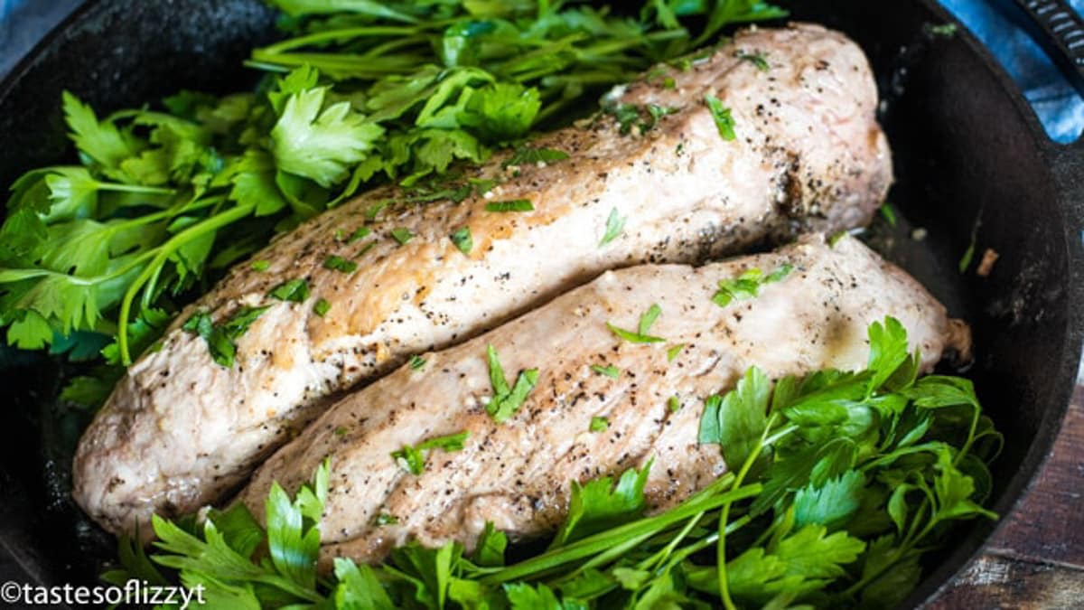 two pork tenderloin in a baking pan