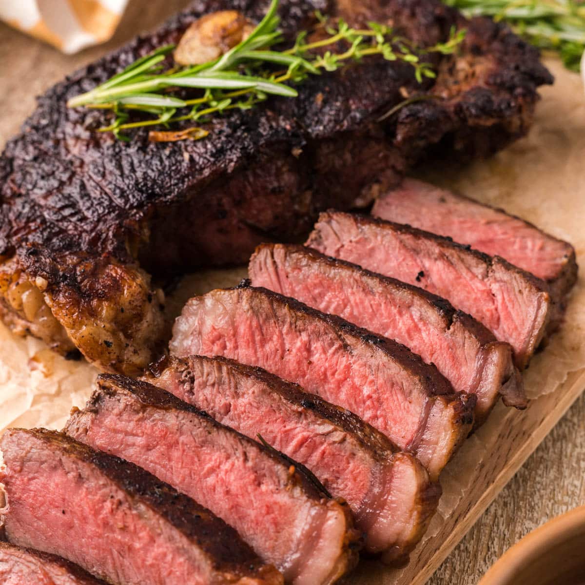 sliced steak on a cutting board