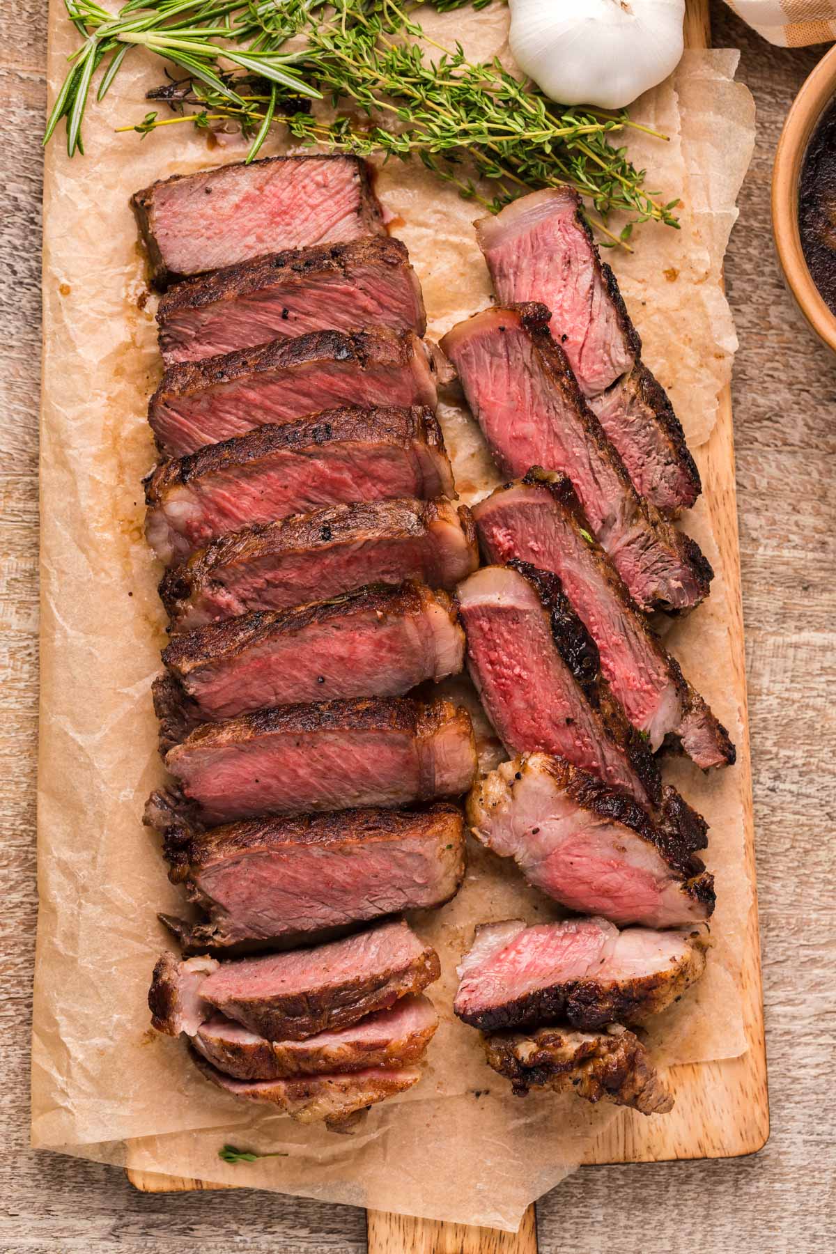 sliced steak on a cutting board