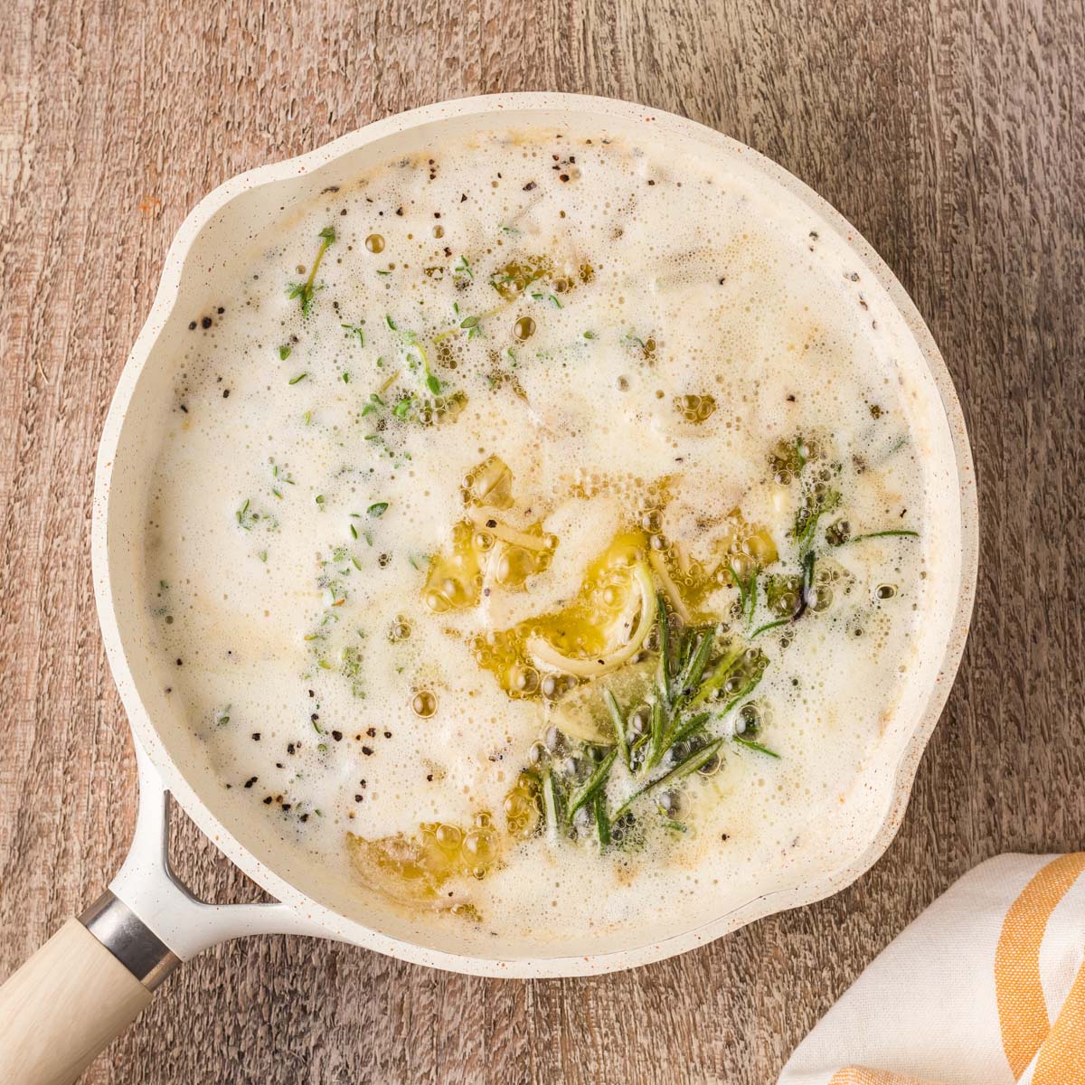 herbed butter with onions in a skillet