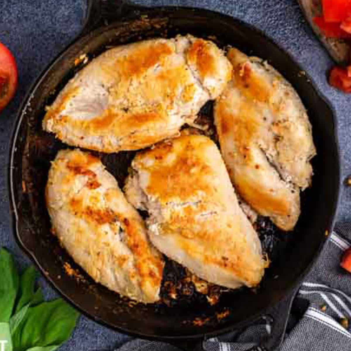 chicken cooked to golden brown in a skillet