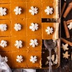 overhead view of sheet pan pumpkin pie with whipped cream on top