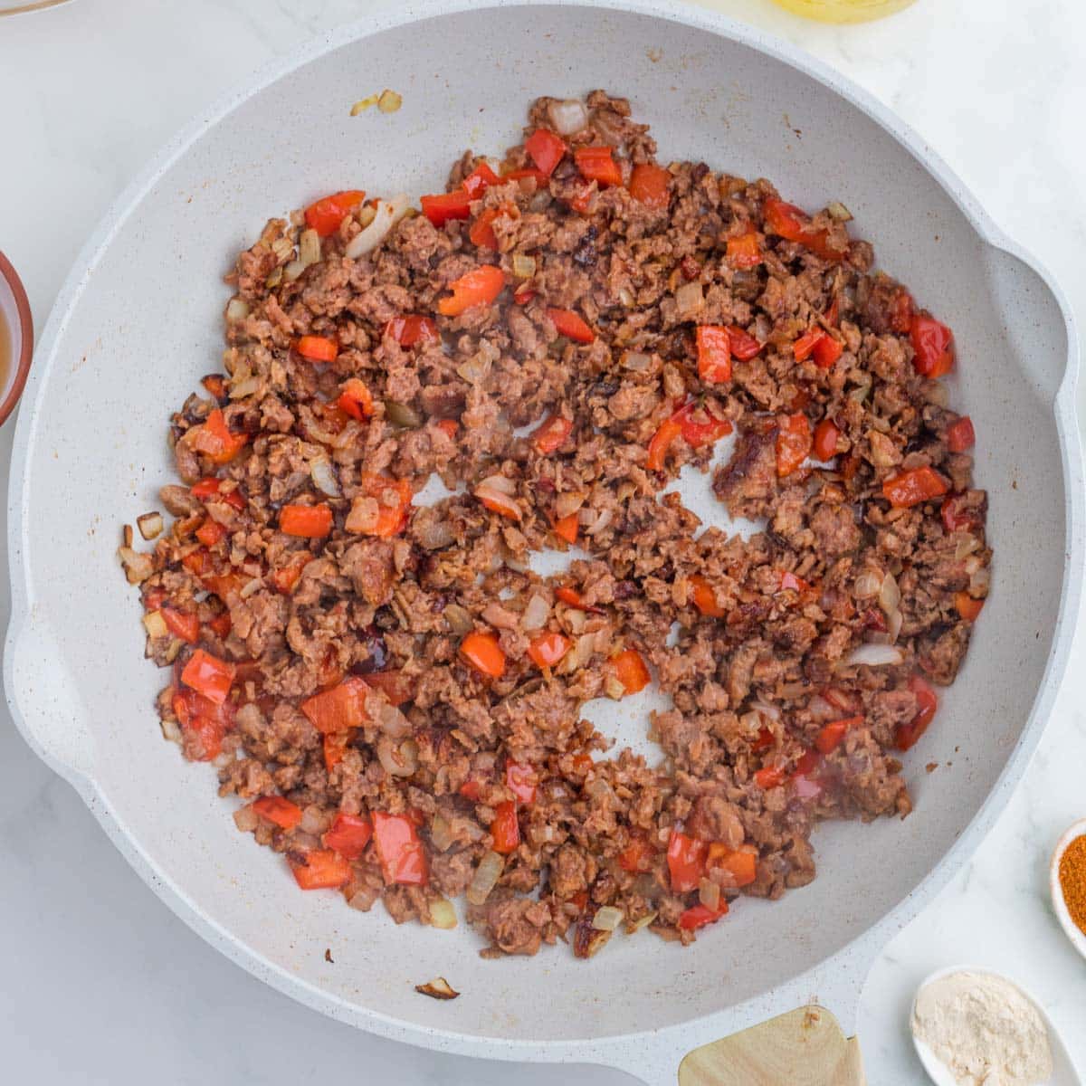 browned ground beef and pepper in a skillet