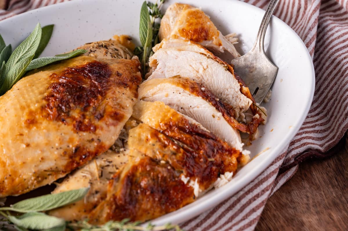 closeup of sliced turkey breast on a plate