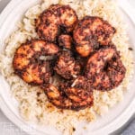 seasoned smoked shrimp on a plate with rice