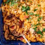 closeup of hamburger macaroni casserole with a spoon