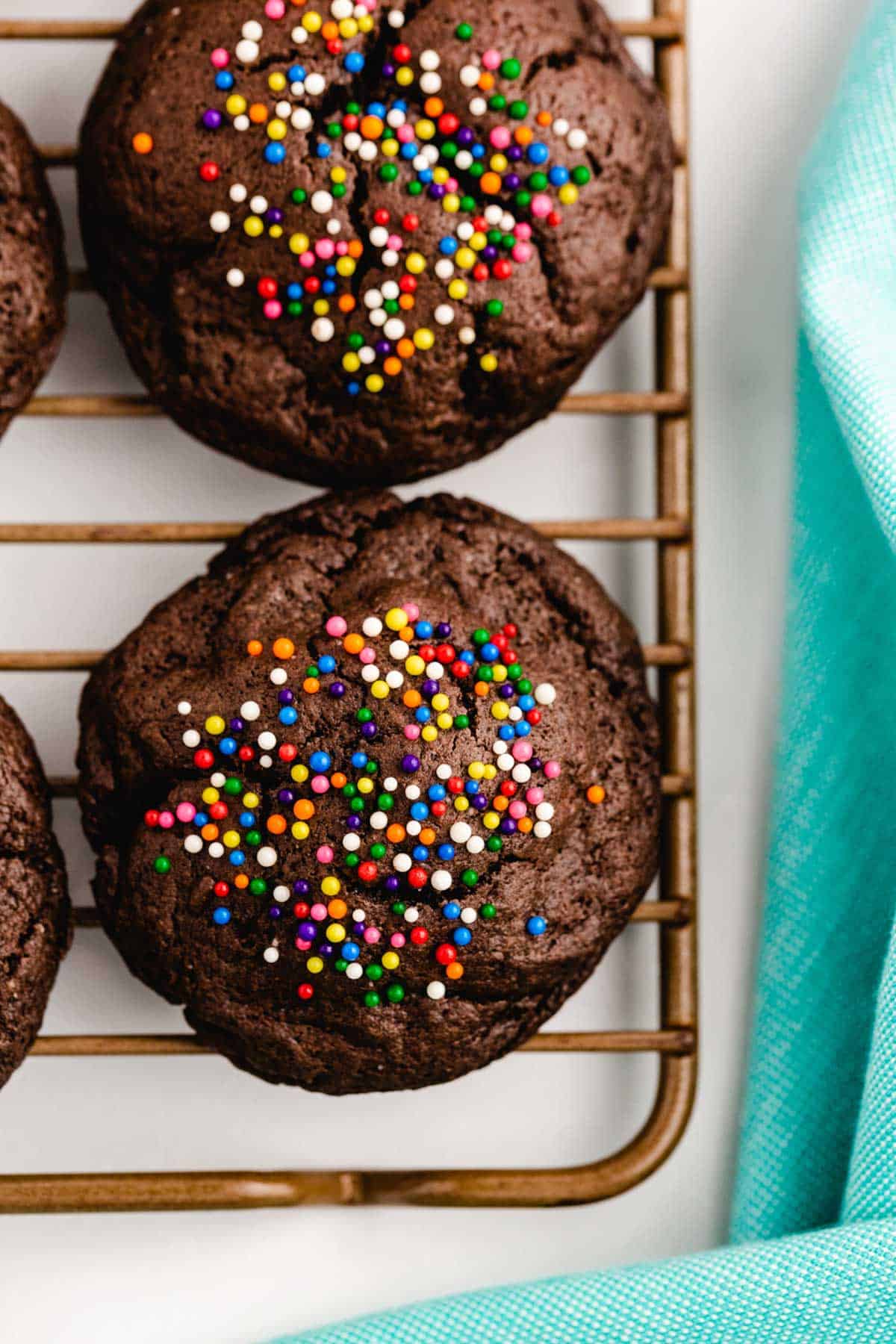 peppermint patty cookies with sprinkles on a wire rack