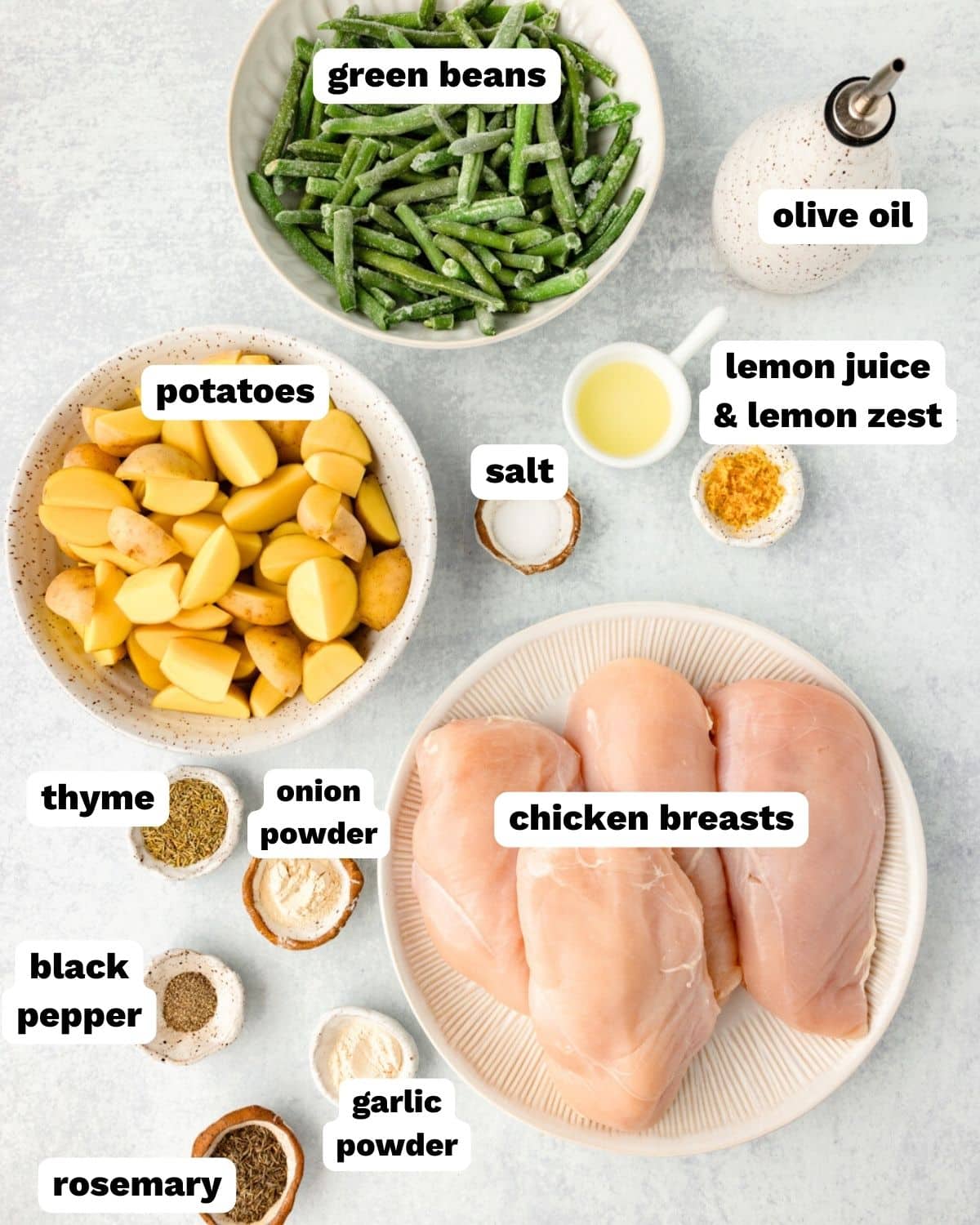 ingredients for lemon chicken sheet pan dinner on a table