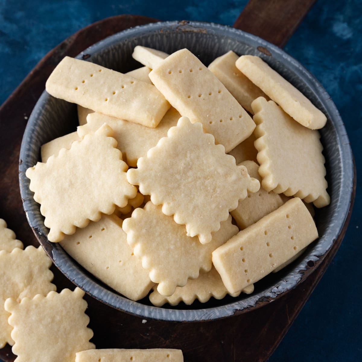 a bowl of shortbread cookies on a table