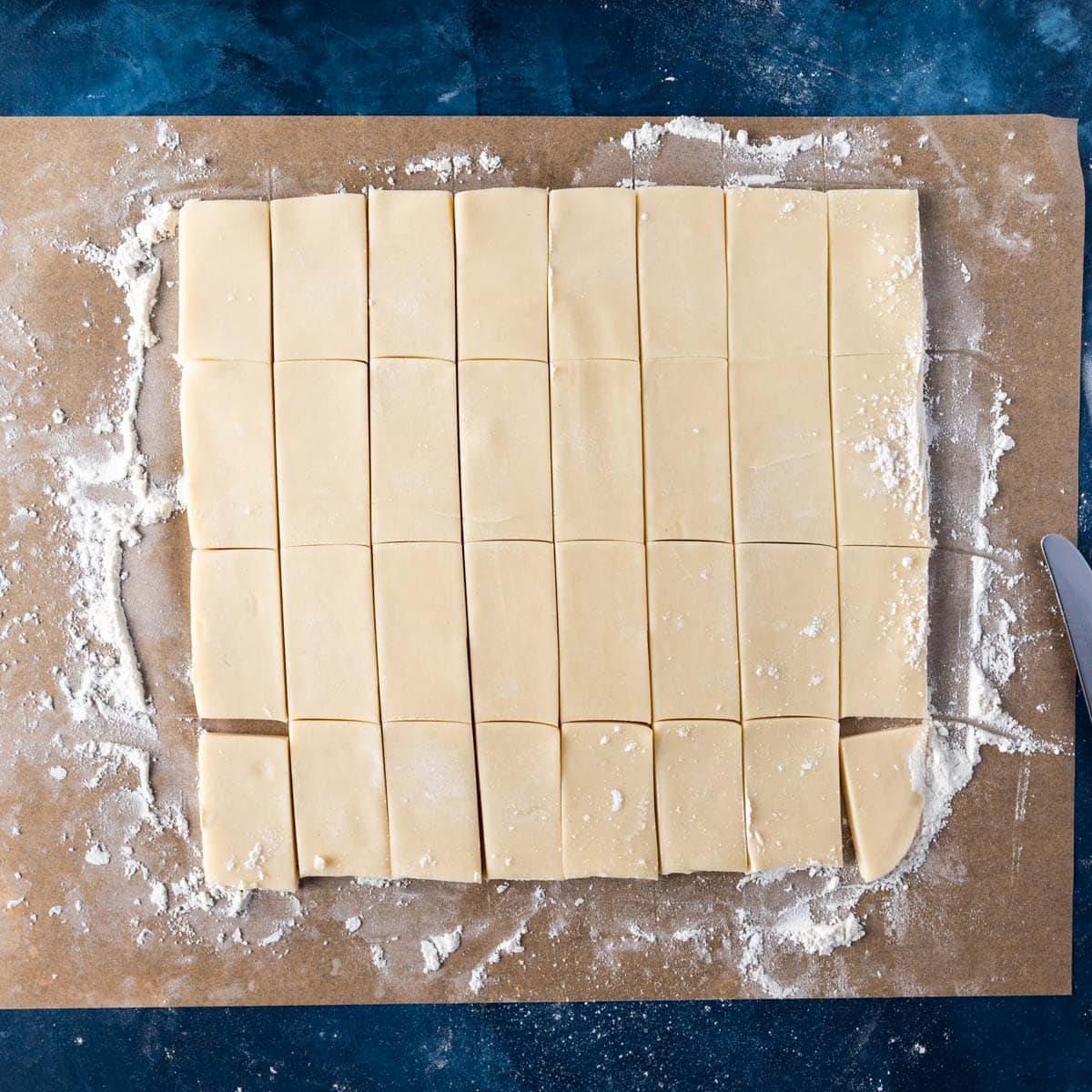 shortbread cookies cut into rectangles on parchment