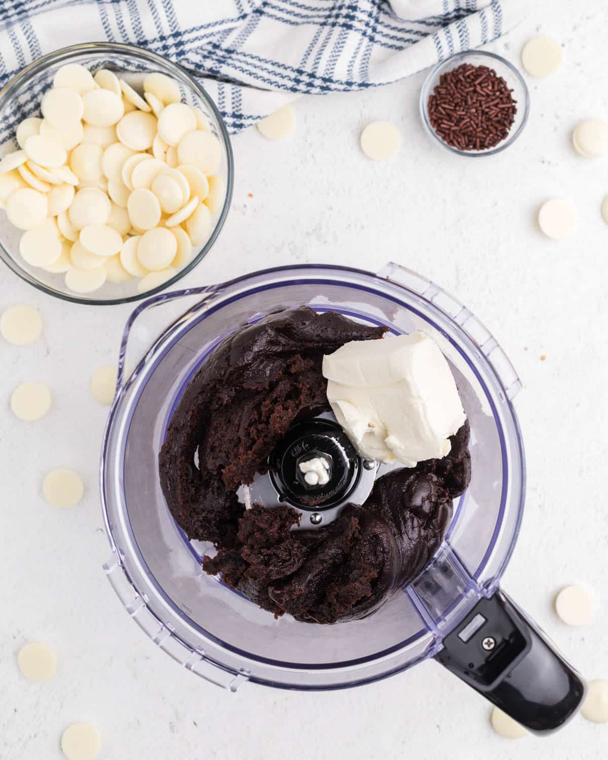 cream cheese and crushed brownies in a food processor