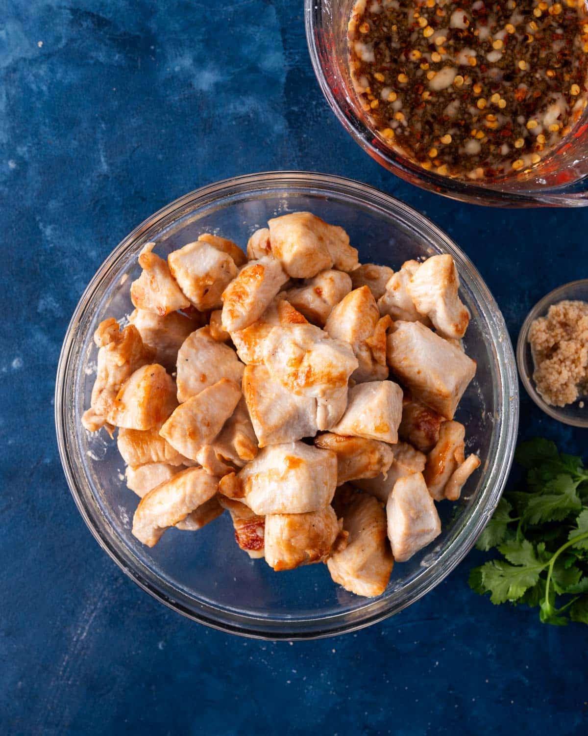 browned chicken in a glass bowl