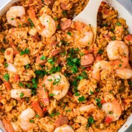 closeup of jambalaya with shrimp and sausage in a pan