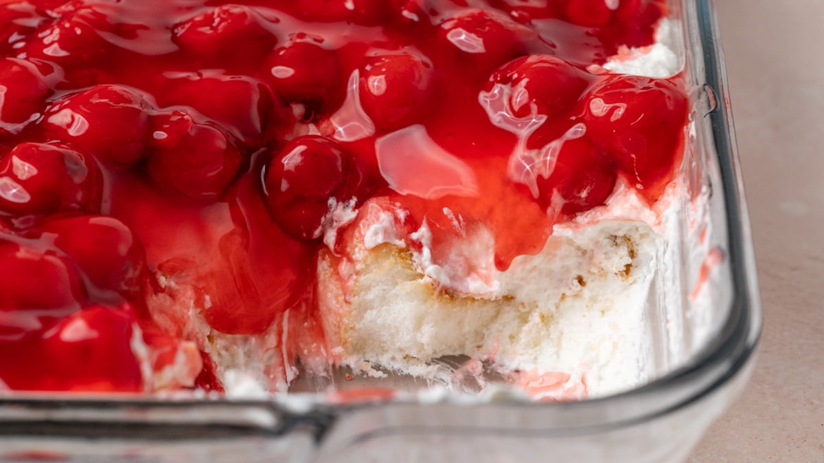 cherries in the snow dessert with one serving out