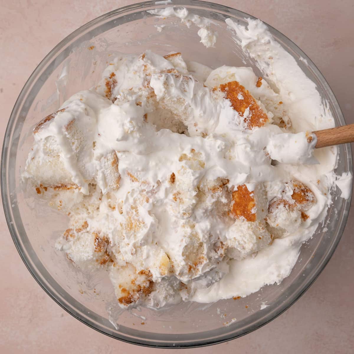 angel food cake with whipped cream in a bowl