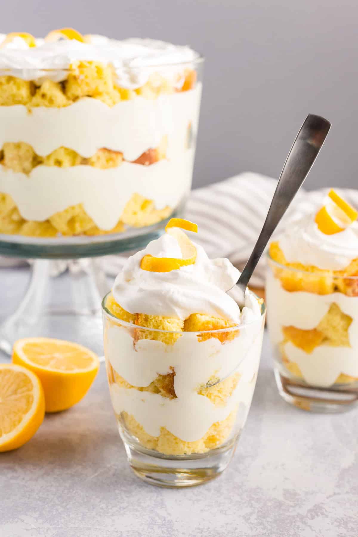 small glass parfaits with lemon cake and whipped cream