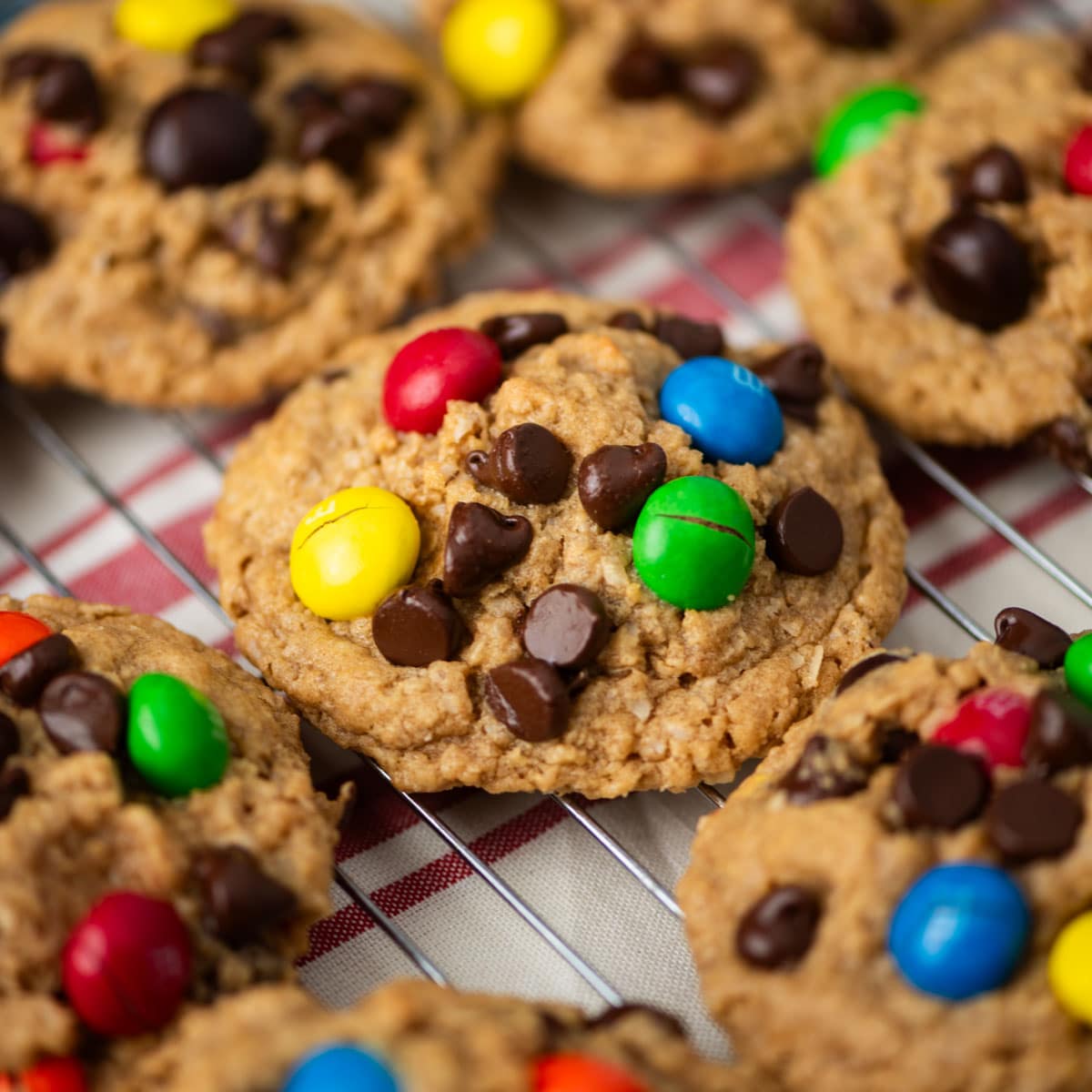 peanut butter monster cookies on a wire rack