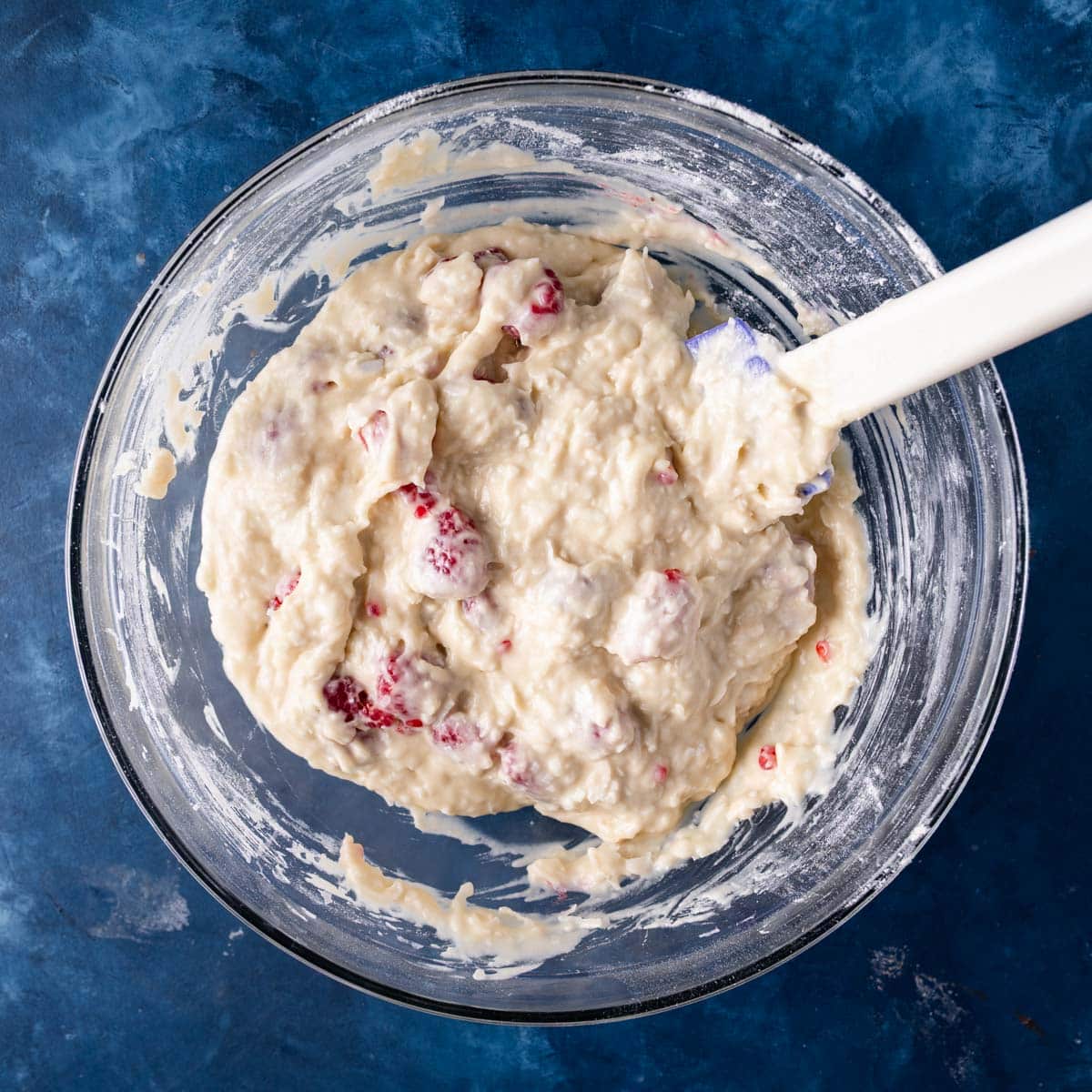 raspberry muffin batter in a bowl