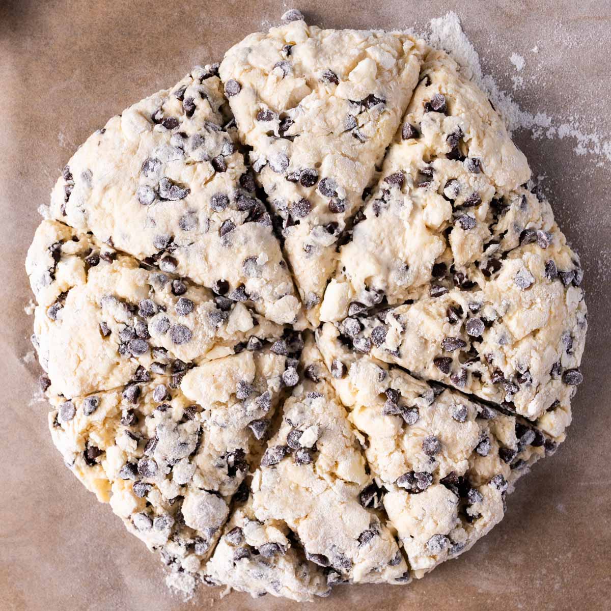 scone dough in a circle cut into wedges