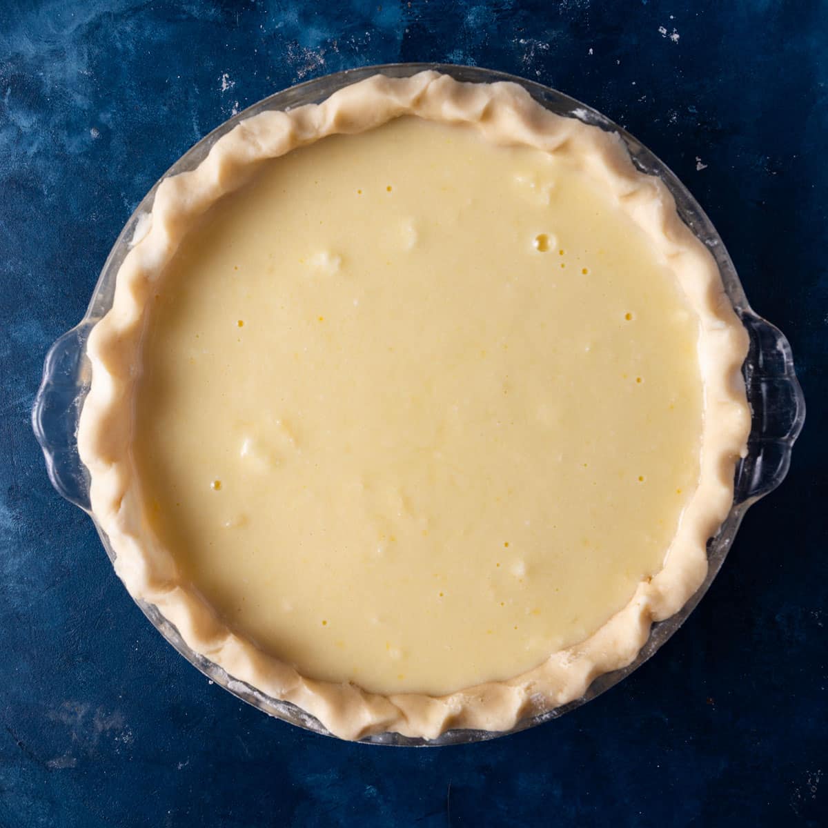 unbaked pie on a table