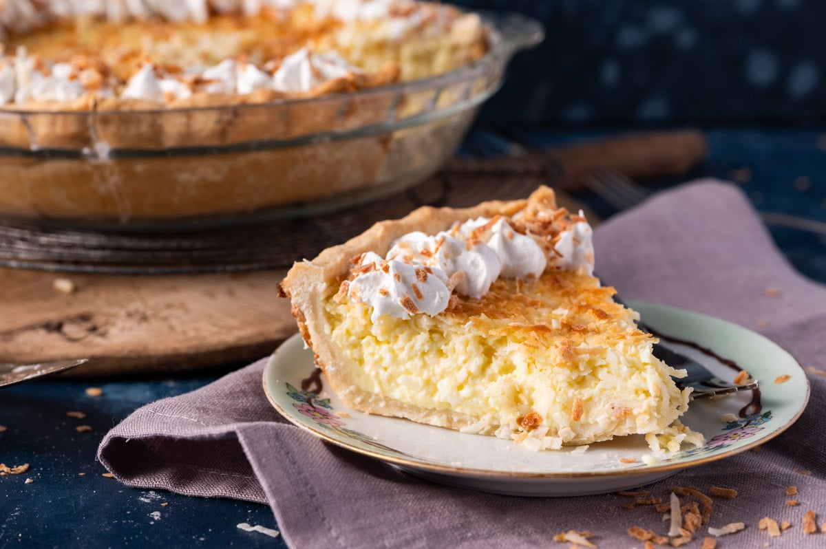 a piece of coconut custard pie on a plate