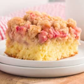 a piece of rhubarb crumb cake on a plate